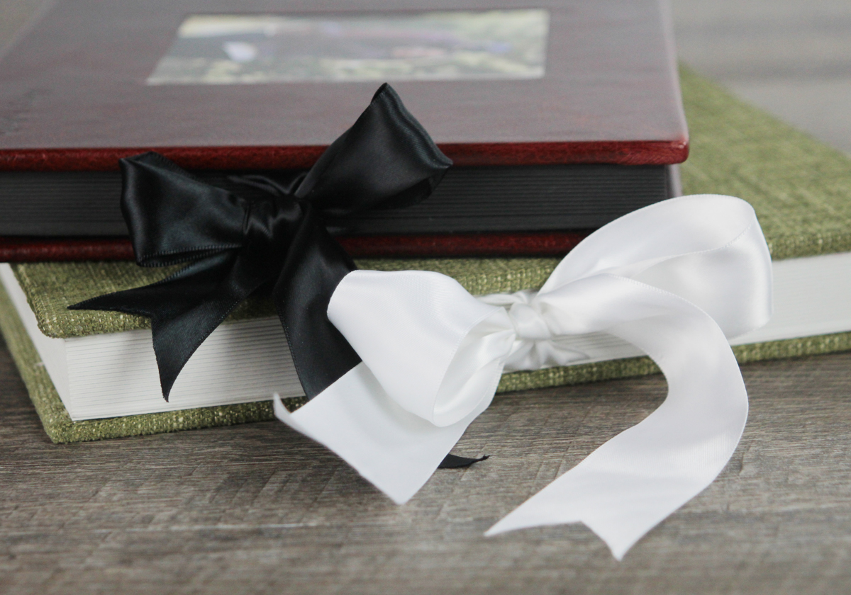 Ribbon ties are available in either white or black