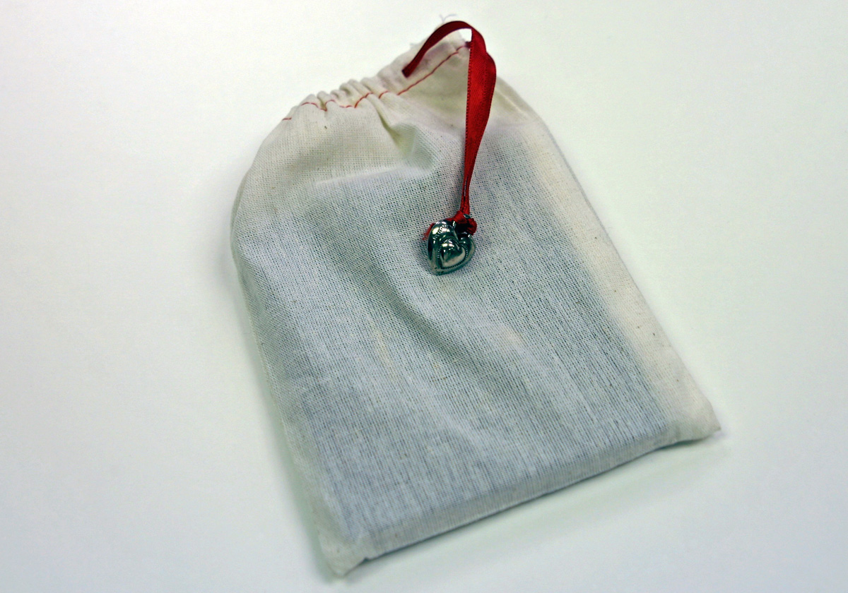 Smaller playBOOKS come in a special drawstring bag with a charm